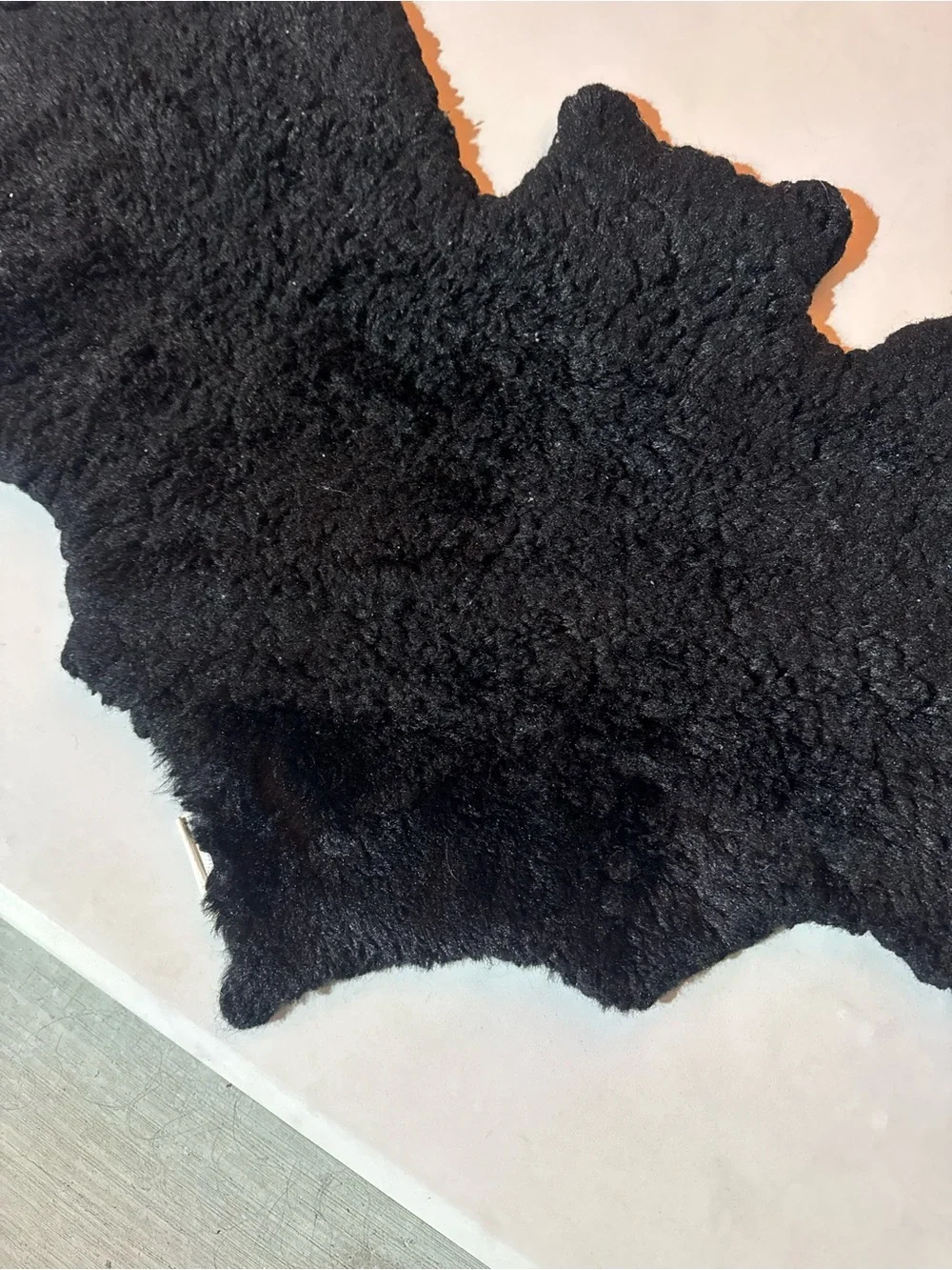 Sourpuss: Furry Bat Rug Black Faux Sheepskin Shag 20x40in